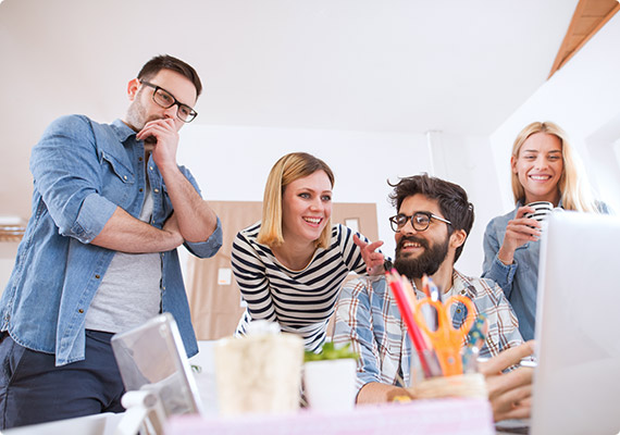 Creative team collaborating on a marketing project